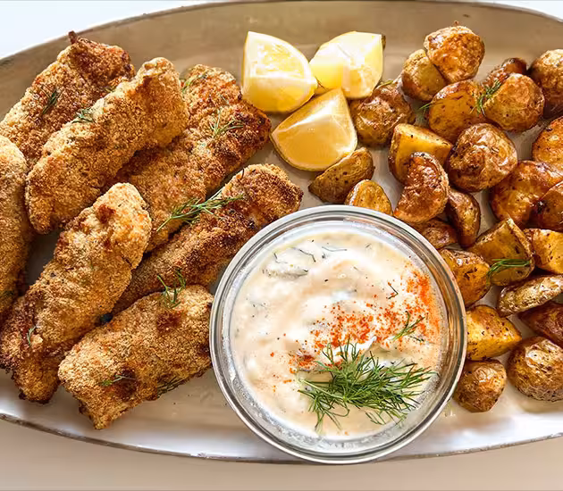 Air-Fried Cod Fish Sticks with Crisp Potatoes and Yogurt Dill Dip