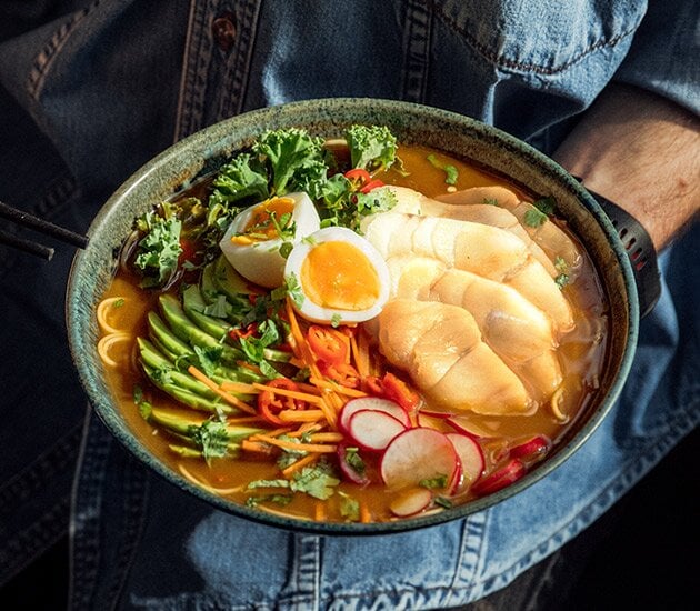 Norwegian cod with ramen, vegetables and egg