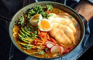 Norwegian cod with ramen, vegetables and egg